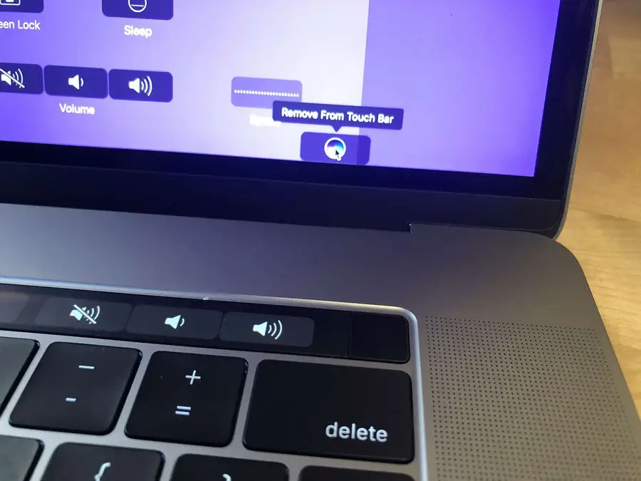 Remove or replace the Touch Bar Siri button