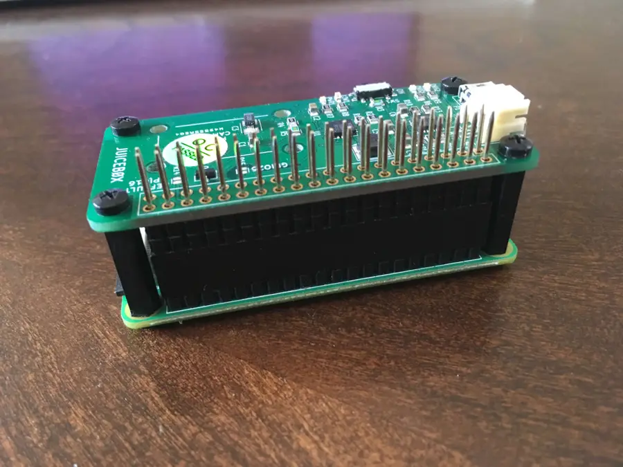 Place the JuiceBox Zero onto the header and secure with screws